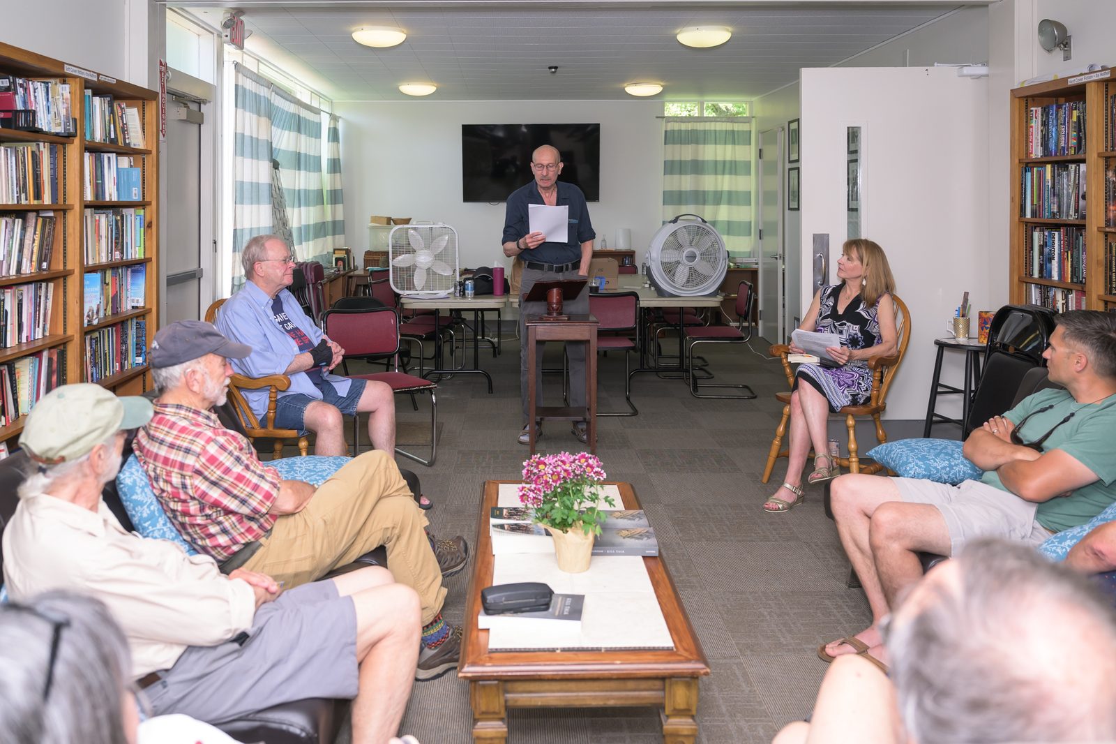 Marc Levy reads at the lectern during the session on the literature of the Vietnam War, with Janet McIntosh seated at right.