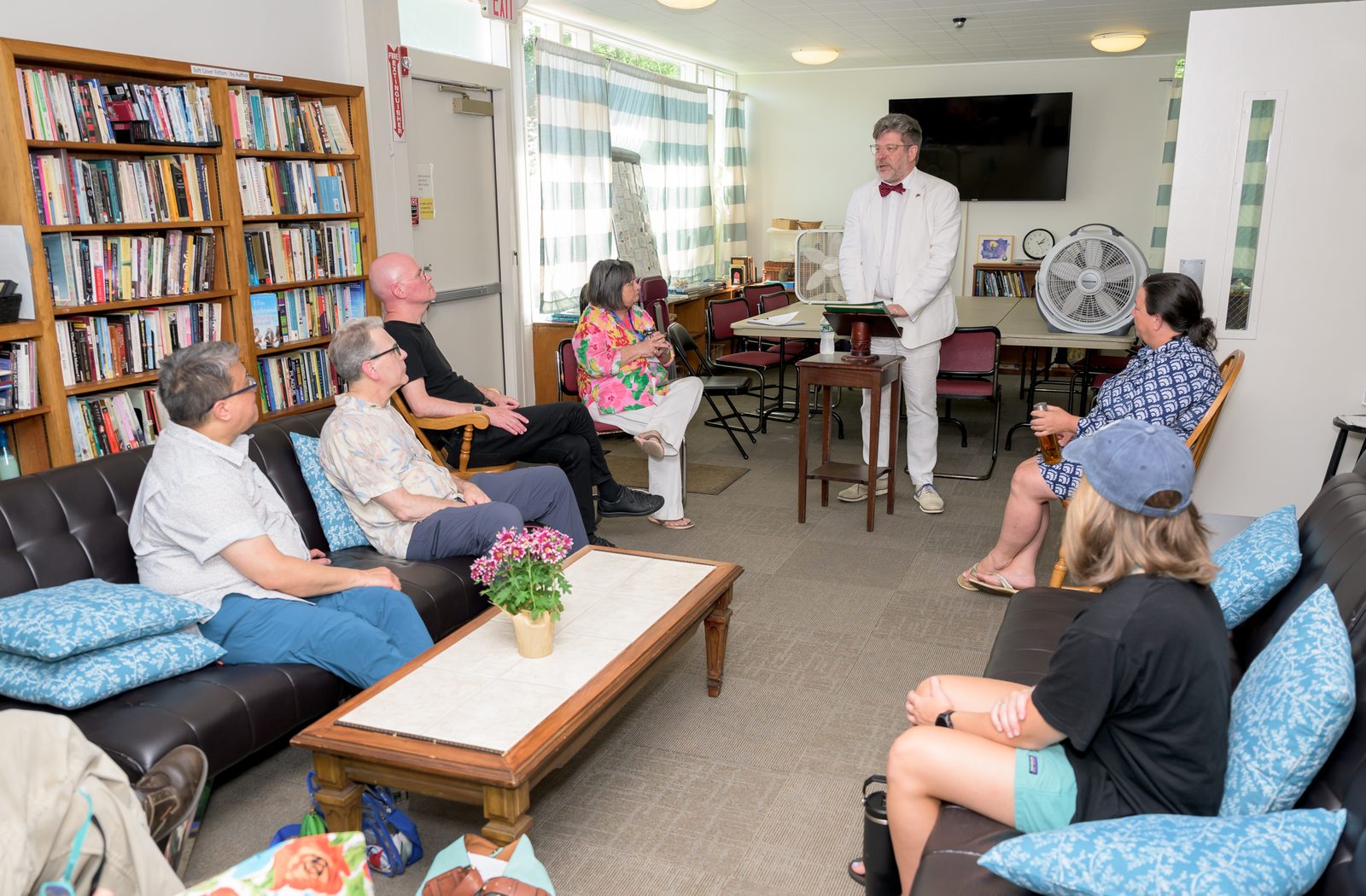 In a white linen suit and red bow tie, Robert Dimmick addresses the audience during his talk ‘Perfectly Proper Letter Writing.’