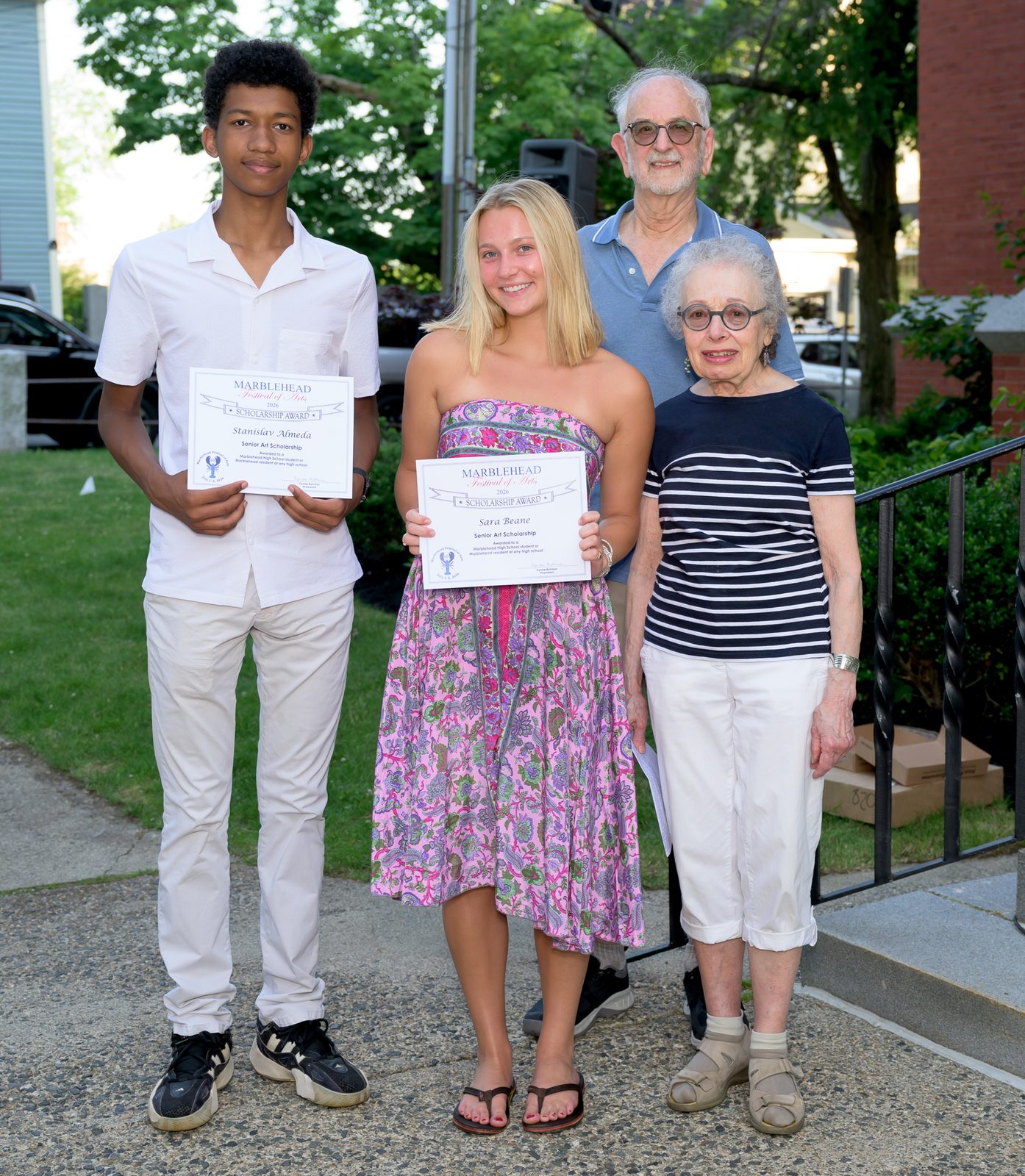 Senior Art Scholarship recipients Stanislav Almeda and Sara Beane pose with their 2026 awards.
