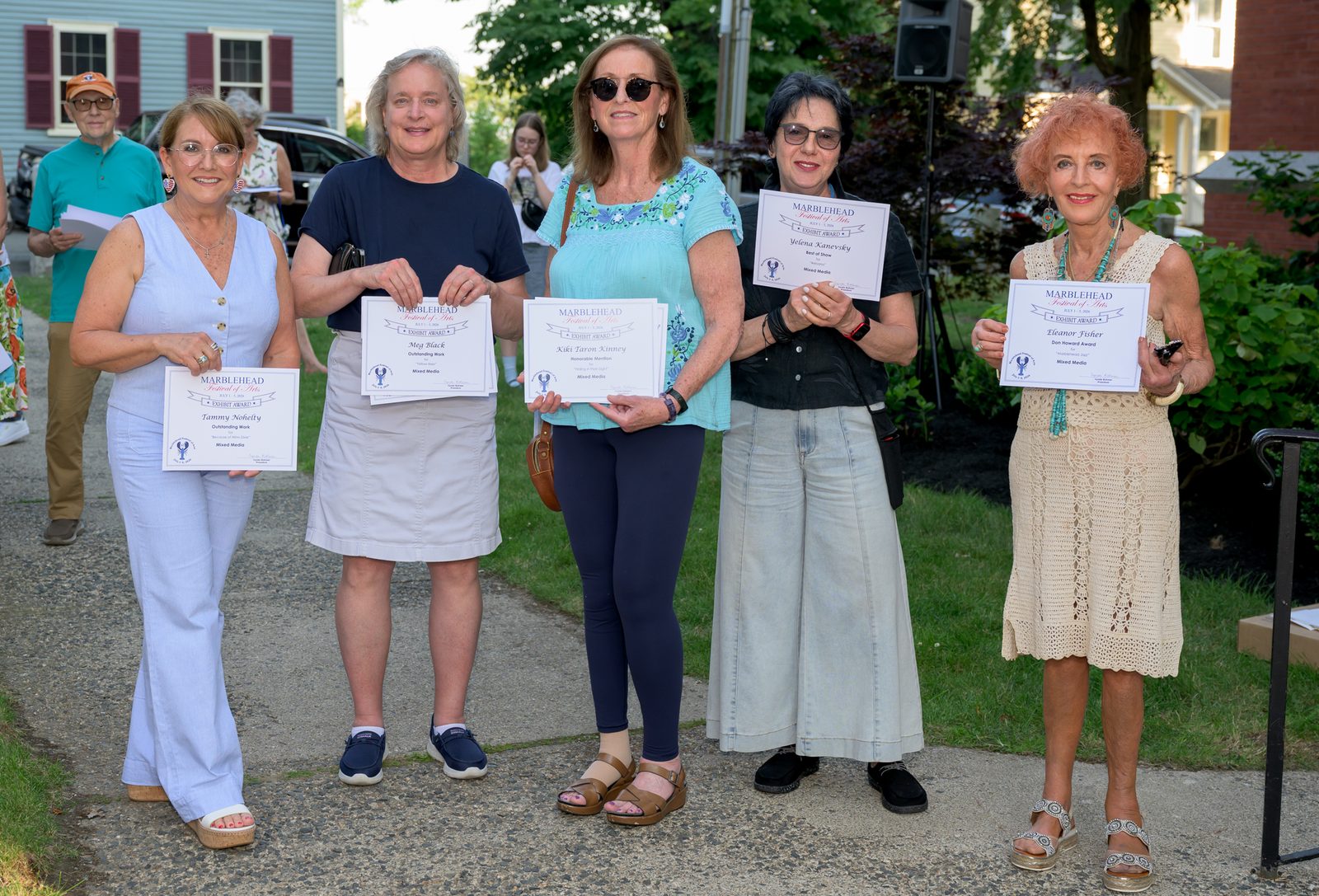Mixed Media winners line up with their certificates, including Best of Show and the Don Howard Award.