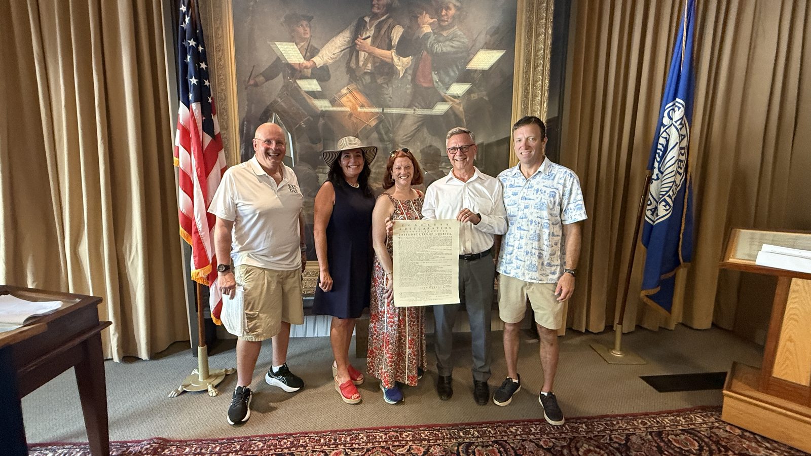 Officials gather with the replica of the Ezekiel Russell printing of the Declaration, presented to the town for the nation’s 250th, before ‘The Spirit of ’76.’